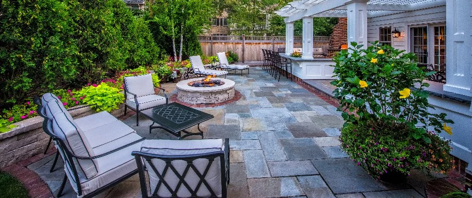 Cozy outdoor patio with seating and fire pit in Milwaukee, WI.