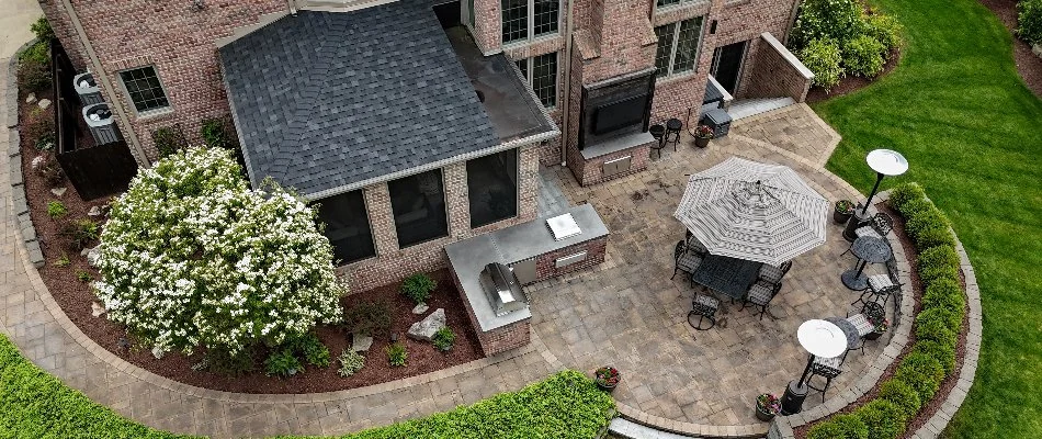 Drone photo of outdoor kitchen and patio area.