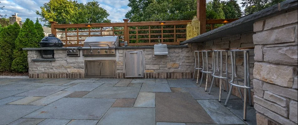 Outdoor kitchen with grill.