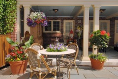 Patio seating and potted plants