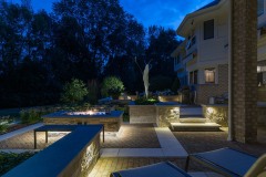 Wisconsin property with landscape lighting in patio