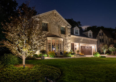 House at night with light and landscaping