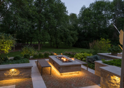 Modern outdoor fireplace and seating area